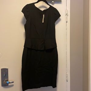 Jcrew black peplum short sleeve dress, hits just below the knee. Brand new w/tag